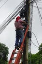 Manila, Philippines, circa March 2023 - electrician doing work