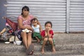 Homeless woman with her children