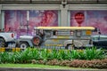 Manila, Philippines - Feb 02, 2020: Jeepneys on the roads of Manila. Former American military jeeps converted to public