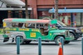 Manila, Philippines - Feb 02, 2020: Jeepneys on the roads of Manila. Former American military jeeps converted to public