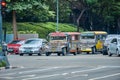 Manila, Philippines - Feb 02, 2020: Jeepneys on the roads of Manila. Former American military jeeps converted to public