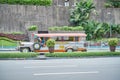 Manila, Philippines - Feb 02, 2020: Jeepneys on the roads of Manila. Former American military jeeps converted to public