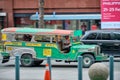 Manila, Philippines - Feb 02, 2020: Jeepneys on the roads of Manila. Former American military jeeps converted to public transport