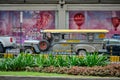 Manila, Philippines - Feb 02, 2020: Jeepneys on the roads of Manila. Former American military jeeps converted to public transport