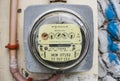 Manila, Philippines - Closeup of vintage electric meter installed by Meralco at a customer`s residence