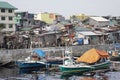 Poverty alone the rivers of Manila in the Philippines