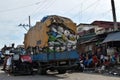 Truckload of sacks of recyclable materials into the city junk yard