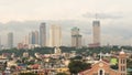 Manila skyscrapers in the cloudy evening. Philippines. Royalty Free Stock Photo