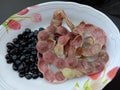 Manila tamarind peel and seed on white plate fruit or vegetable.