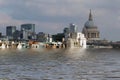 manipulated conceptual image of the city of london with historic buildings flooded due to global warming and rising sea levels Royalty Free Stock Photo