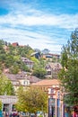 Houses cling to mountainside in smal hippy town under Pikes Peak