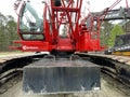 Manitowoc Red Crane Construction scene cloudy rainy day front weight