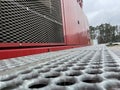 Manitowoc Red Crane Construction scene cloudy rainy day steel step platform