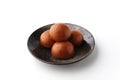 manjyu Japanese traditional confectionery cake wagashi on plate isolated on white background Royalty Free Stock Photo