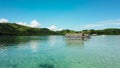 Manlawi Sandbar floating cottages in Caramoan Islands. A lagoon with floating crotches, top view.