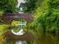 Manley Bridge The Grand Western Canal, Tiverton, Devon. With reflection.