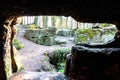 Manmade cave in sandstone rock Royalty Free Stock Photo