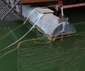 Manmade fabricated floating cast iron pontoon platform welding underneath to support marina dock systems, including boathouse and Royalty Free Stock Photo