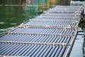 Manmade synthetic plastic pipe floating pontoon for supporting a variety of marina dock systems including harbors, flotation docks Royalty Free Stock Photo