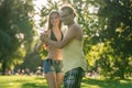 Mann turning woman while dancing Bachata in the sun Royalty Free Stock Photo