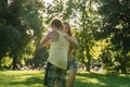 Mann turning woman while dancing Bachata in the sun Royalty Free Stock Photo