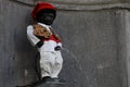 Brussels, Belgium - a statue of little Manneken Pis seen close to the Grand Place