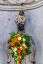 Manneken pis statue in costume in Brussels, Belgium Royalty Free Stock Photo