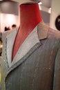 Mannequin with basted jacket by a tailor