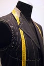 Mannequin with basted  jacket by a tailor Royalty Free Stock Photo