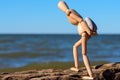 Mannequin carries a heavy stone