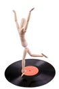 Mannequin dancing on vinyl disc Royalty Free Stock Photo
