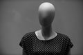 Mannequin without face. dummy imitating faceless woman in fashion blouse