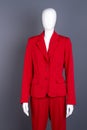 Mannequin in red female formal style suit. Royalty Free Stock Photo