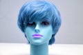 Mannequin head with blue wig Royalty Free Stock Photo