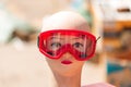 Mannequin head for protective safety eyewear on traditional street market festival