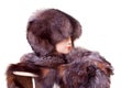 Mannequin head wearing fur hat and collar