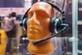 Mannequin in headphones with microphone