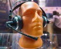 Mannequin in headphones with microphone