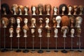 mannequin heads displaying finished wigs