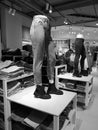 Mannequin of the legs of a girl in jeans on a showcase in the market. Royalty Free Stock Photo