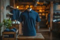 Concept Fashion, Mannequin modeling a dark blue polo shirt in a minimalist store setting Royalty Free Stock Photo