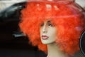 Mannequin with orange wig Royalty Free Stock Photo