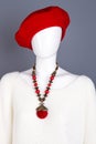 Mannequin with red beret and white sweater. Royalty Free Stock Photo