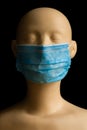 Mannequin wearing a surgical mask