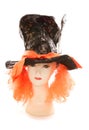 Mannequin wearing Mad hatter tea party hat and wig Royalty Free Stock Photo