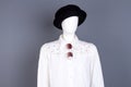 Mannequin in white blouse and black hat. Royalty Free Stock Photo