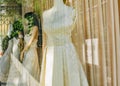 Mannequin in window display. Showcase mannequin wedding dress Royalty Free Stock Photo