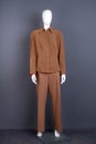 Mannequin in women brown suit.