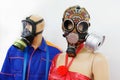 Mannequins man and woman in inlaid gas masks. The concept of air pollution and environmental disruption. Close-up