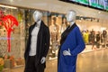 Mannequins standing in the shop window Display casual woman and man clothing store in the Mall Royalty Free Stock Photo